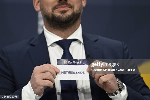 Former Netherlands international player Wesley Sneijder draws out the card of Netherlands during the UEFA Nations League finals draw at the UEFA...