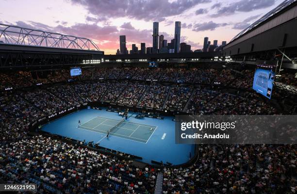 The sun sets over Rod Laver Arena as Novak Djokovic in action against Andrey Rublev in their Quarter Final Match at the Australian Open grand slam...