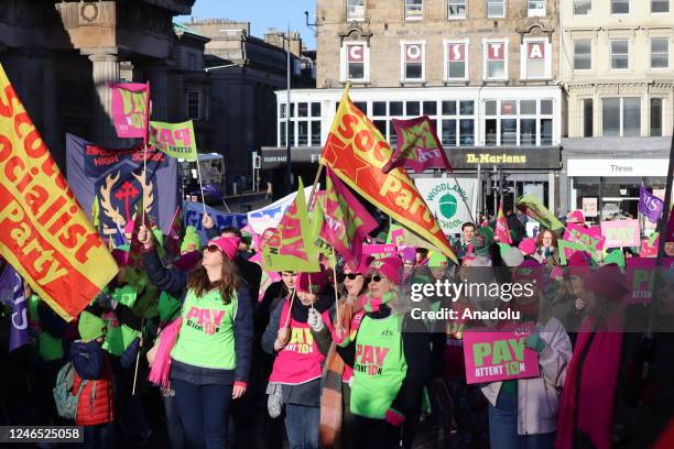 Teachers gather to demonstrate as they continue their strike demanding a raise of wages and enhancing of their working conditions in Edinburgh,...