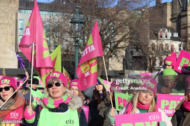 Teachers gather to demonstrate as they continue their strike demanding a raise of wages and enhancing of their working conditions in Edinburgh,...