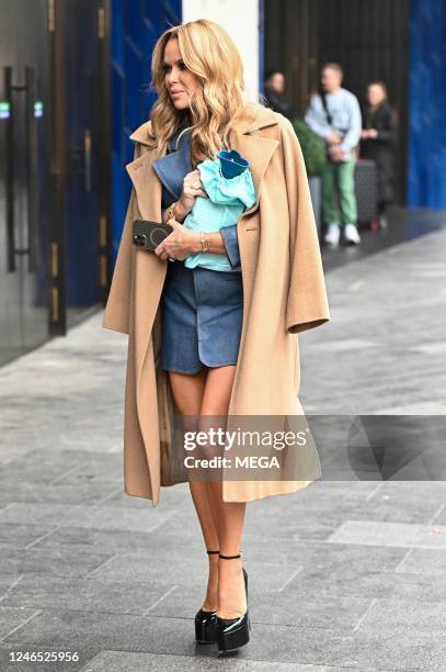 January 25: Amanda Holden holding a hot water bottle is seen leaving the Londoner Hotel for the 'Britains Got Talent' Auditions on January 25, 2023...