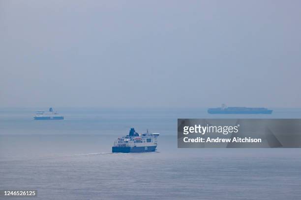 Cross channel DFDS seaways ferries pass each other outside the port of Dover, United Kingdom on the 25th of January 2023. They cross the 34...