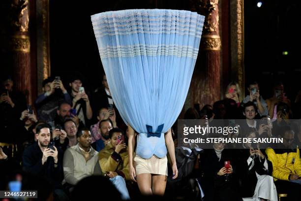 Model presents a creation for Viktor & Rolf during the Haute-Couture Spring-Summer 2023 Fashion Week in Paris on January 25, 2023.