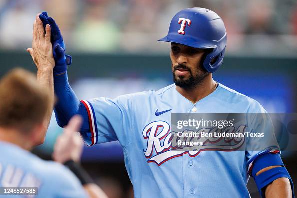 Marcus Semien of the Texas Rangers celebrates a home run during a ...