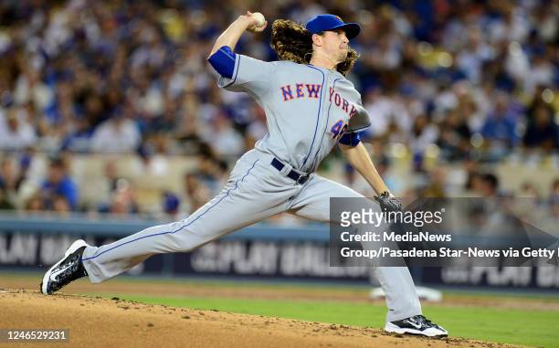 New York Mets starting pitcher Jacob deGrom throws against the Los Angeles Dodgers in the first inning of a Major League Baseball National League...