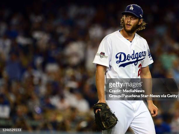 Los Angeles Dodgers starting pitcher Clayton Kershaw walks off the mound at the end of first inning of a Major League Baseball National League...