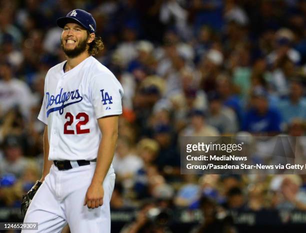 Los Angeles Dodgers starting pitcher Clayton Kershaw reacts after a base hit in the seventh inning of a Major League Baseball National League...
