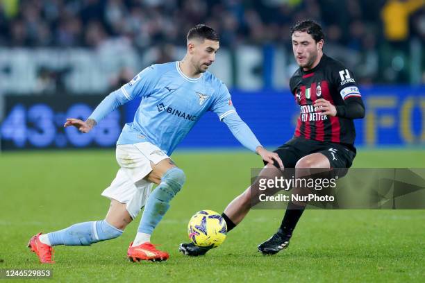 Davide Calabria of AC Milan and Mattia Zaccagni of SS Lazio compete for the ball during the Serie A match between SS Lazio and AC Milan at Stadio...