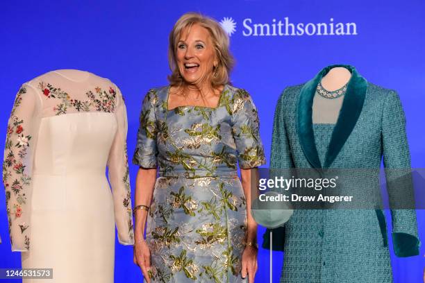 First Lady Jill Biden smiles during an event to present her Inauguration Day attire to the Smithsonian's First Ladies collection at the Smithsonian...