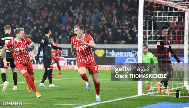 Freiburg's German defender Matthias Ginter celebrates his 1-1 during the German first division Bundesliga football match between SC Freiburg and...