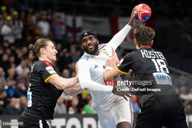 Gdansk, Poland Dika Mem of France Juri Knorr of Germany and Julian Koster of Germany seen in action during the IHF Men´s World Championship 2023 -...