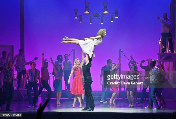 Kira Malou and Michael O'Reilly perform with cast during the press night performance of "Dirty Dancing" at the Dominion Theatre on January 25, 2023...