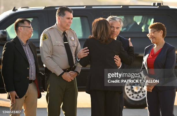 Vice President Kamala Harris is greeted by Monterey Park mayor Henry Lo, Los Angeles County Sheriff Robert Luna, California's attorney general Rob...