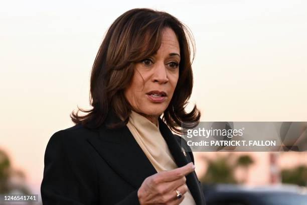 Vice President Kamala Harris speaks after paying tribute to the victims of the mass shooting in front of a makeshift memorial at the Star Ballroom...