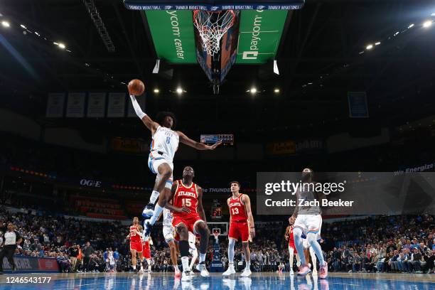 Jalen Williams of the Oklahoma City Thunder drives to the basket during the game against the Atlanta Hawks on January 25, 2023 at Paycom Arena in...