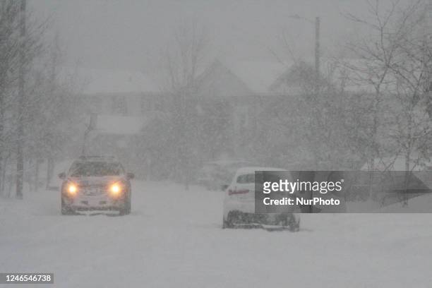 Drivers navigate slippery roads as a massive snowstorm hit Toronto, Ontario, Canada, on January 25, 2023. The storm is expected to drop between 20-25...