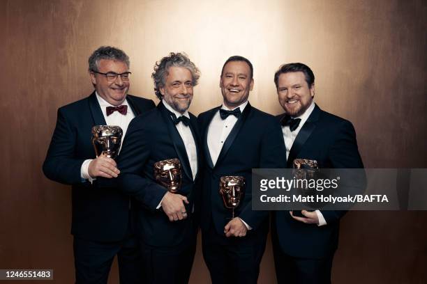 Special effects artists Gerd Nefzer, Paul Lambert, Brian Connor, Tristan Myles are photographed at BAFTA's EE British Academy Film Awards on March...