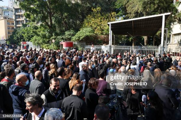 Relatives of victims killed in the 2020 Beirut port explosion, rally outside the palace of justice in the Lebanese capital, to support the judge...