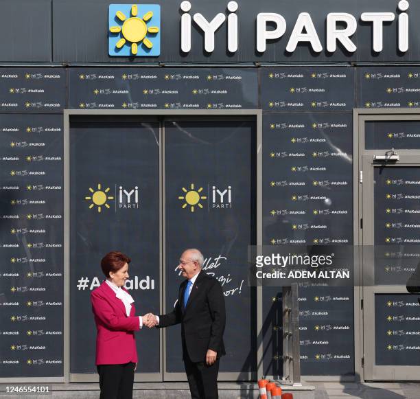 Turkey's Iyi nationalist Party head Meral Aksener shakes hand with main opposition Republican People's Party party's leader Kemal Kilicdaroglu before...