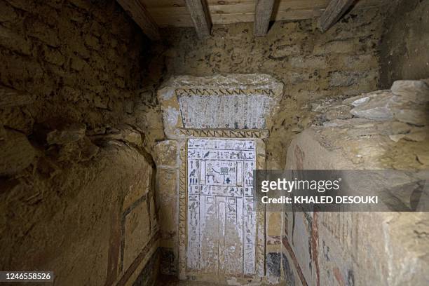 Picture shows a view inside the recently discovered tomb at the Saqqara archaeological site, south of Cairo, on January 26, 2023. - The vast burial...
