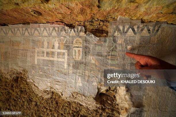 Picture shows a view inside the recently discovered tomb at the Saqqara archaeological site, south of Cairo on January 26, 2023. - The vast burial...