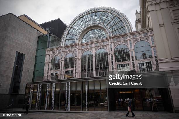 People walk past the Royal Opera House on January 26, 2023 in London, England. The Royal Opera House decided not to renew its funding agreement with...