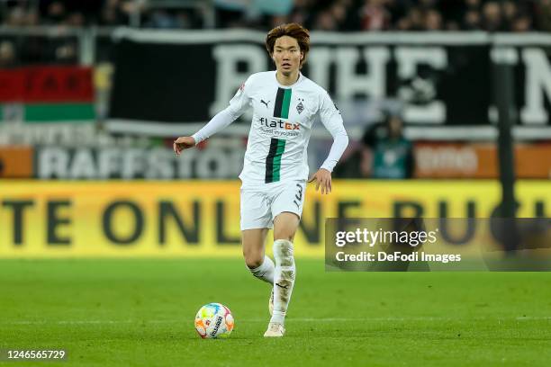 Ko Itakura of Borussia Moenchengladbach controls the ball during the Bundesliga match between FC Augsburg and Borussia Mönchengladbach at WWK-Arena...