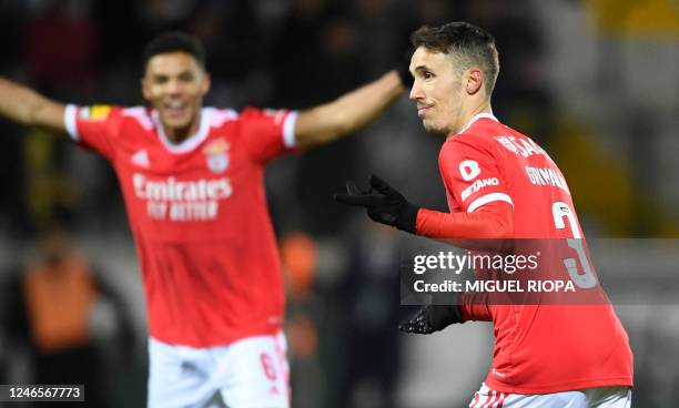 Benfica's Spanish defender Alex Grimaldo celebrates after scoring his team's first goal during the Portuguese league football match between FC Pacos...
