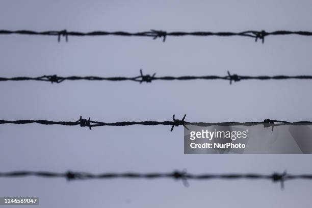 Barb wired fence in the former Nazi German Auschwitz I concentration camp at Auschwitz Memorial Site a day ahead of 78th Anniversary Of Auschwitz -...