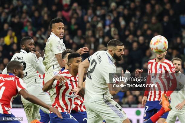 Real Madrid's Brazilian defender Eder Militao looks at the ball during the Copa del Rey , quarter final football match between Real Madrid CF and...