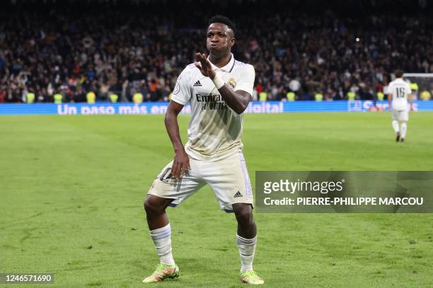 Real Madrid's Brazilian forward Vinicius Junior celebrates after scoring his team's third goal during the Copa del Rey , quarter final football match...
