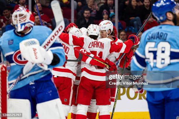 The Detroit Red Wings celebrate after scoring a goalduring the second period of the NHL regular season game between the Montreal Canadiens and the...