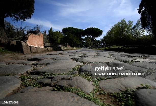 The Appian Way is pictured in Rome on January 26, 2023. - All roads lead to Rome, as the saying goes, and the most prestigious is the Appian Way, the...