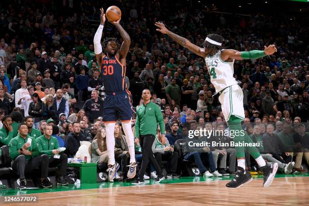 Julius Randle of the New York Knicks shoots a three point basket during the game against the Boston Celtics on January 26, 2023 at the TD Garden in...