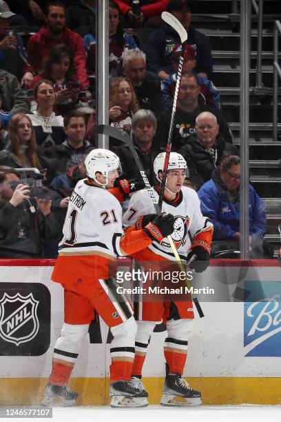 Isac Lundestrom and Frank Vatrano of the Anaheim Ducks celebrate a goal against the Colorado Avalanche at Ball Arena on January 26, 2023 in Denver,...