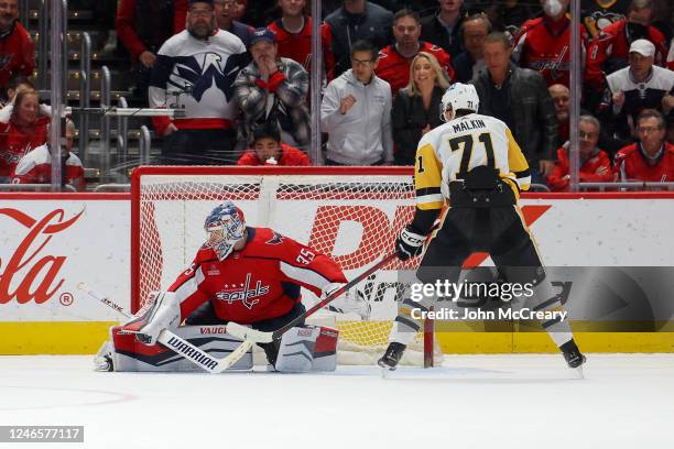 Darcy Kuemper of the Washington Capitals makes a save on Evgeni Malkin of the Pittsburgh Penguins for the shootout win during a game at Capital One...