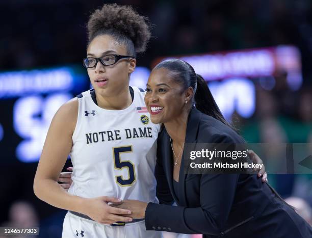 Olivia Miles and head coach Niele Ivey of the Notre Dame Fighting Irish are seen during the game against the Florida State Seminoles at Joyce Center...