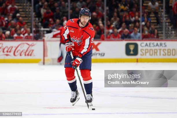 Evgeny Kuznetsov of the Washington Capitals collects the puck for a shootout attempt during a game against the Pittsburgh Penguins at Capital One...