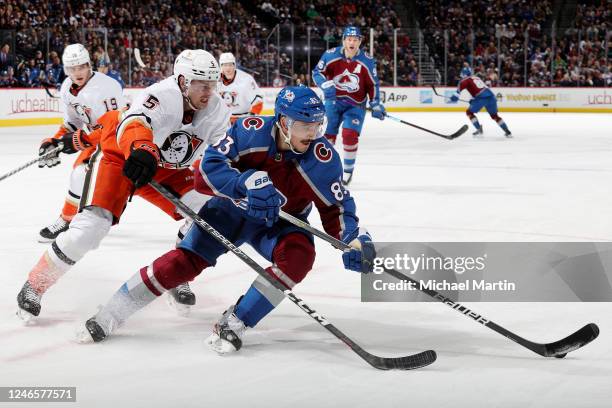 Matt Nieto of the Colorado Avalanche skates against Urho Vaakanainen of the Anaheim Ducks at Ball Arena on January 26, 2023 in Denver, Colorado.