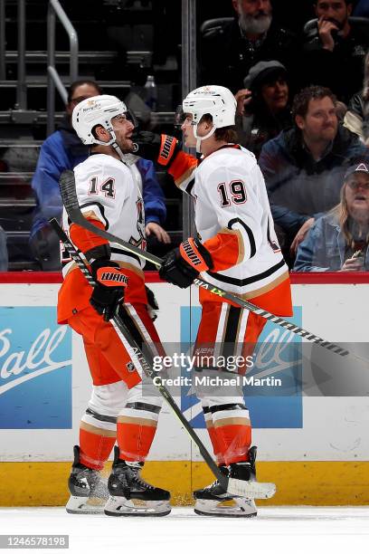 Adam Henrique and Troy Terry of the Anaheim Ducks celebrate a goal against the Colorado Avalanche at Ball Arena on January 26, 2023 in Denver,...