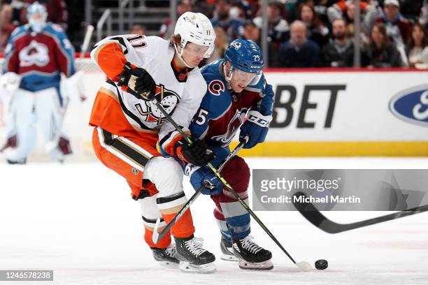 Trevor Zegras of the Anaheim Ducks skates against Logan O'Connor of the Colorado Avalanche at Ball Arena on January 26, 2023 in Denver, Colorado.