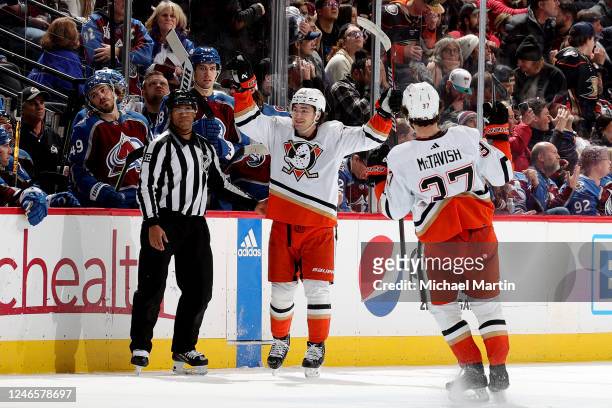 Frank Vatrano and Mason McTavish of the Anaheim Ducks celebrate Vatrano's hat trick against the Colorado Avalanche at Ball Arena on January 26, 2023...