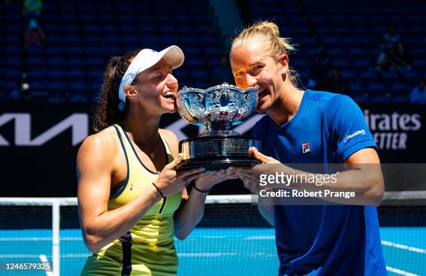 Luisa Stefani of Brazil and Rafael Matos pose with the championship trophy after defeating Sania Mirza of India and Rohan Bopanna of India in the...