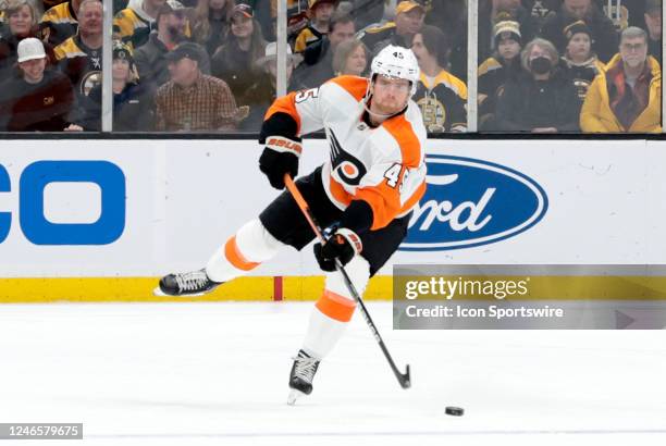 Philadelphia Flyers defenseman Cam York fires a pass during a game between the Boston Bruins and the Philadelphia Flyers on January 16 at TD Garden...