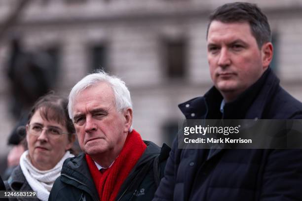 John McDonnell , Labour MP for Hayes and Harlington, and John Finucane , Sinn Fein MP for Belfast North, are pictured at a vigil to commemorate the...