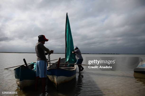 Casper and Yeiner, Wayuu indigenous people, work in the Navio Quebrado lagoon to take tourists to see pink flamingos in Riohacha, La Guajira,...