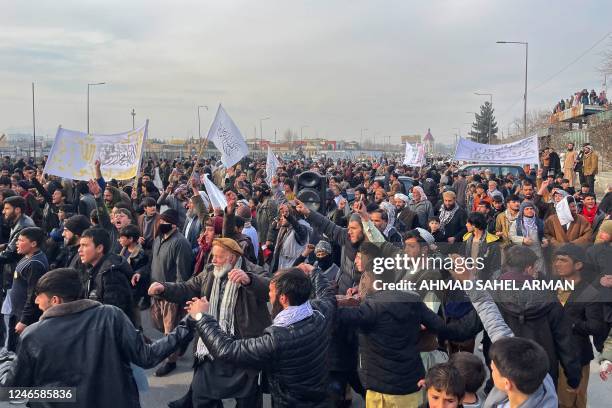 Men shout slogans during a protest after Friday prayers against the burning of the Koran by Swedish-Danish far-right politician Rasmus Paludan, in...