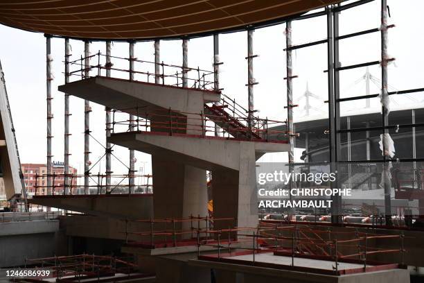 This photograph taken on January 27 shows the construction of diving platforms of the Aquatic Olympic Center , the swimming pool, which will host...