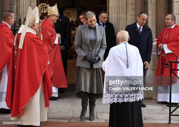 Princess Charlene of Monaco leaves the cathedral as she takes part in the traditional festivities of Sainte Devote in the Principalty of Monaco on...