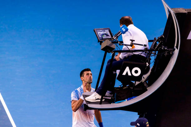 Novak Djokovic of Serbia speaks to the umpire after a period of play during the Semifinals of the 2023 Australian Open on January 27 2023, at...